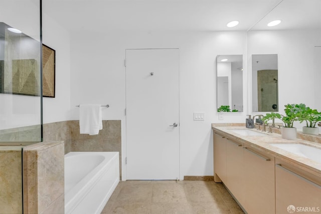 425 1st St Unit 1902, San Francisco, CA 94105 - bathroom with a garden tub, double vanity, a shower, and tile patterned flooring