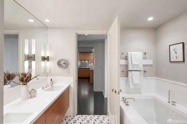 765 Market St Unit 32H, San Francisco, CA 94103 - bathroom with recessed lighting, a sink, a bath, and double vanity