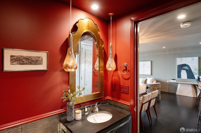 765 Market St Unit 32H, San Francisco, CA 94103 - bathroom featuring recessed lighting, baseboards, wood finished floors, and vanity