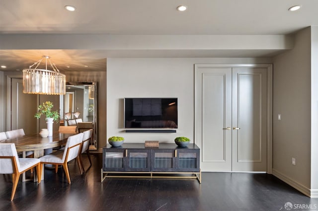 765 Market St Unit 32H, San Francisco, CA 94103 - dining room featuring recessed lighting, baseboards, wood finished floors, and a notable chandelier
