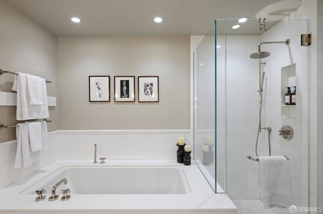 765 Market St Unit 32H, San Francisco, CA 94103 - full bathroom with recessed lighting, a bath, and a shower stall