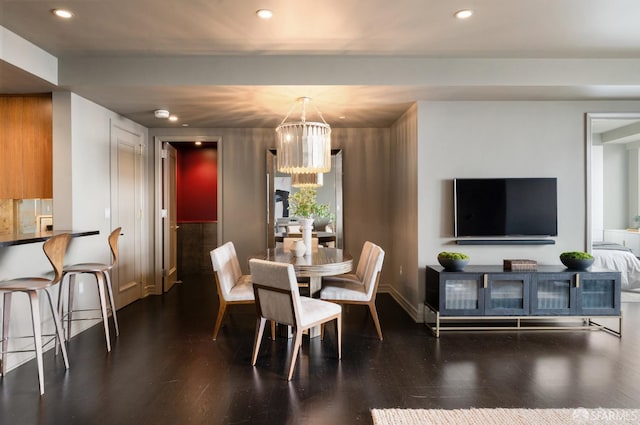 765 Market St Unit 32H, San Francisco, CA 94103 - dining room with an inviting chandelier, baseboards, recessed lighting, and dark wood finished floors