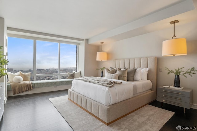765 Market St Unit 32H, San Francisco, CA 94103 - bedroom with expansive windows and wood finished floors