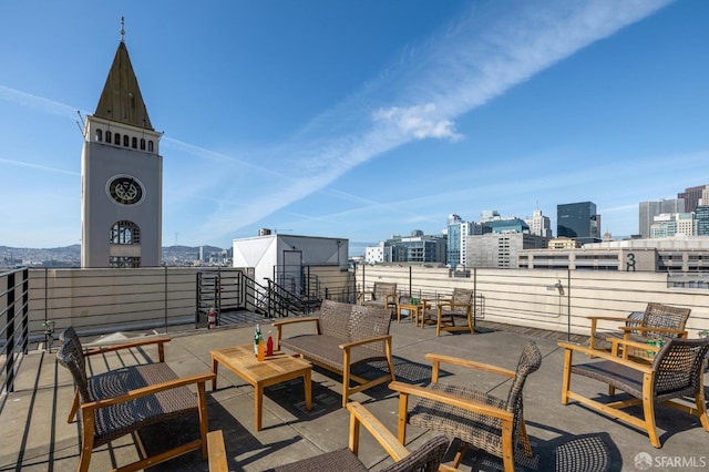 view of patio / terrace featuring exterior fireplace