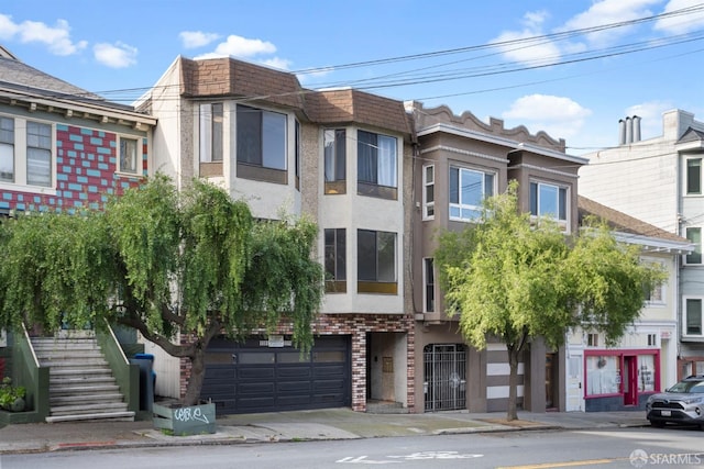 view of property with a garage