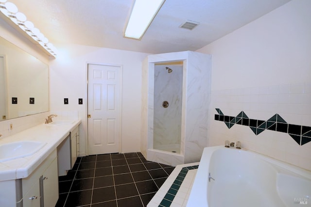 bathroom with vanity, separate shower and tub, and tile patterned floors