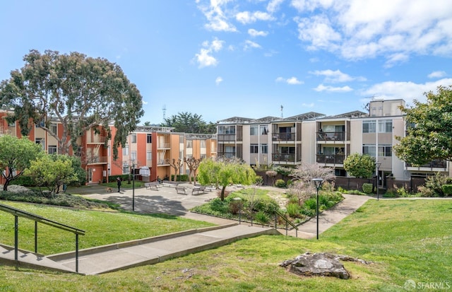 view of community featuring a yard