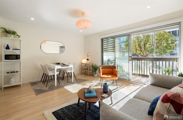 living room with light wood-type flooring