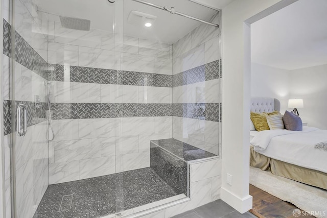 bathroom featuring a tile shower