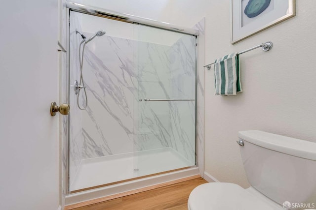 3685 Nutwood Ter Unit 313, Fremont, CA 94536 - bathroom with toilet, a marble finish shower, and wood finished floors