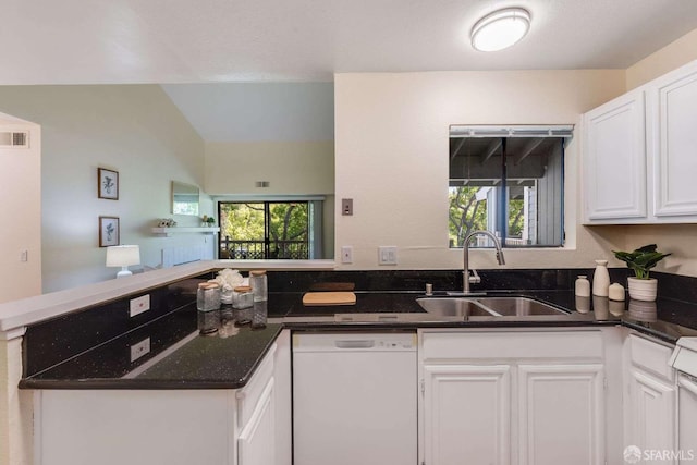 3685 Nutwood Ter Unit 313, Fremont, CA 94536 - kitchen featuring dishwasher, a sink, white cabinetry, a peninsula, and dark stone countertops