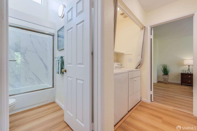 3685 Nutwood Ter Unit 313, Fremont, CA 94536 - hallway with light wood finished floors and washing machine and dryer