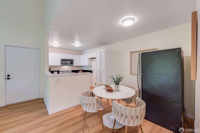 3685 Nutwood Ter Unit 313, Fremont, CA 94536 - dining area featuring light wood-style floors