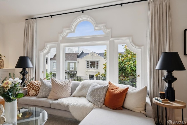 living room with a towering ceiling