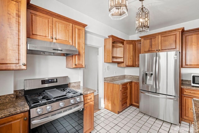 kitchen featuring under cabinet range hood, a chandelier, brown cabinets, stainless steel appliances, and open shelves