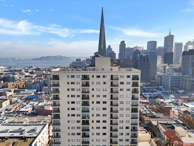 property's view of city featuring a water view