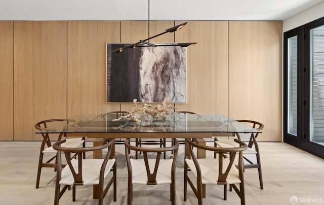 dining space with light wood-type flooring