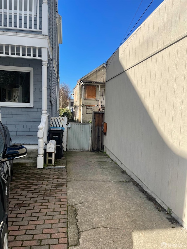 view of side of home with a patio area