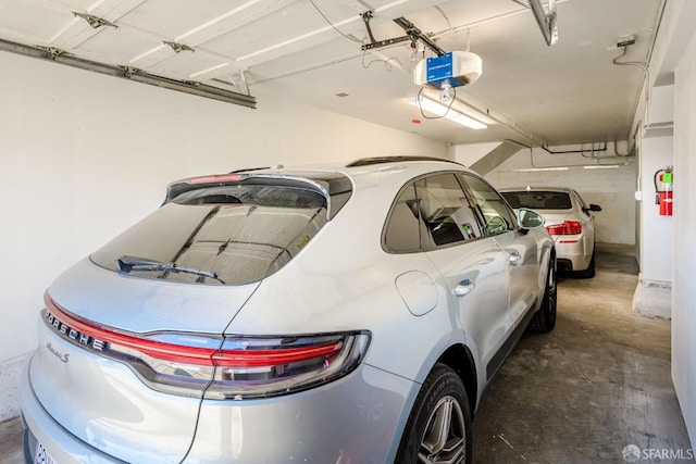 garage featuring a garage door opener