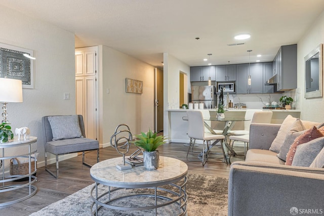 1396 El Camino Real Unit 110, Millbrae, CA 94030 - living room with dark wood finished floors