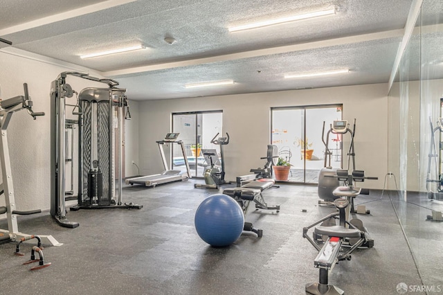 1396 El Camino Real Unit 110, Millbrae, CA 94030 - exercise room featuring a textured ceiling