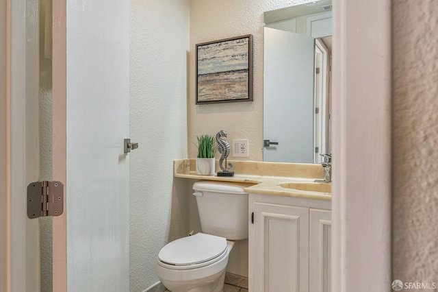 1396 El Camino Real Unit 110, Millbrae, CA 94030 - half bath featuring a textured wall, vanity, and tile patterned floors