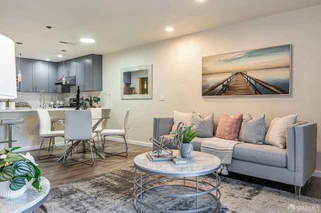 1396 El Camino Real Unit 110, Millbrae, CA 94030 - living area featuring wood finished floors and recessed lighting