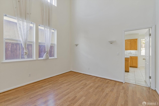 empty room with light wood-type flooring