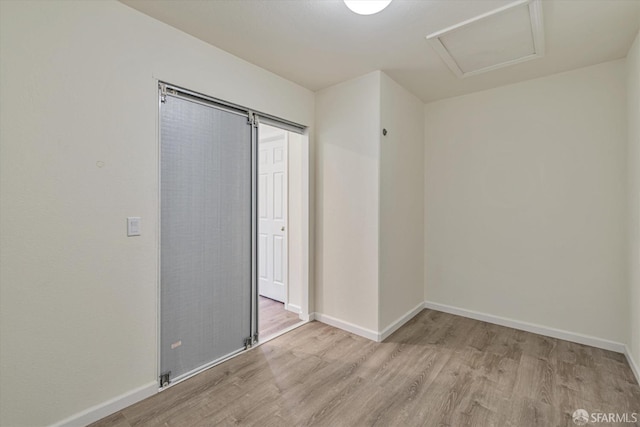 unfurnished room featuring light wood-type flooring