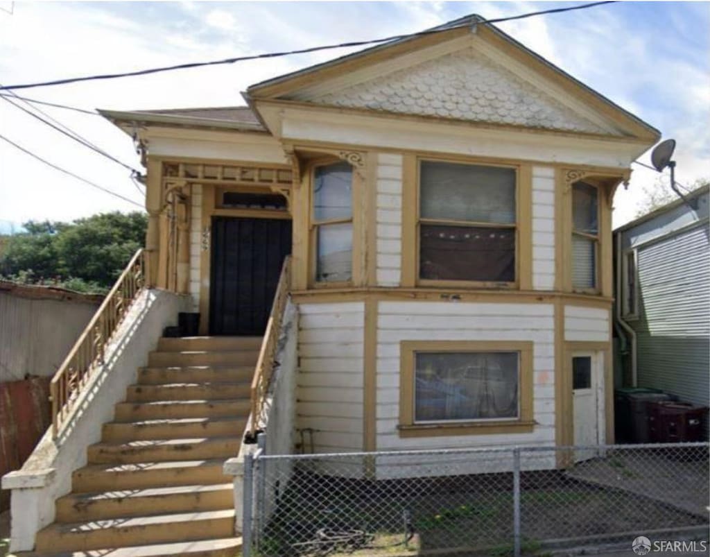 exterior space with a fenced front yard