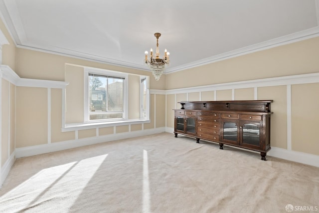 interior space with a chandelier and carpet flooring