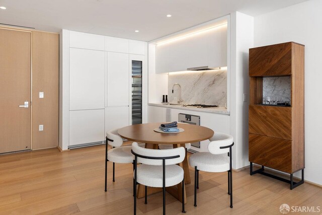 1 Steuart Ln Unit 608, San Francisco, CA 94105 - dining room with light wood-style floors and recessed lighting