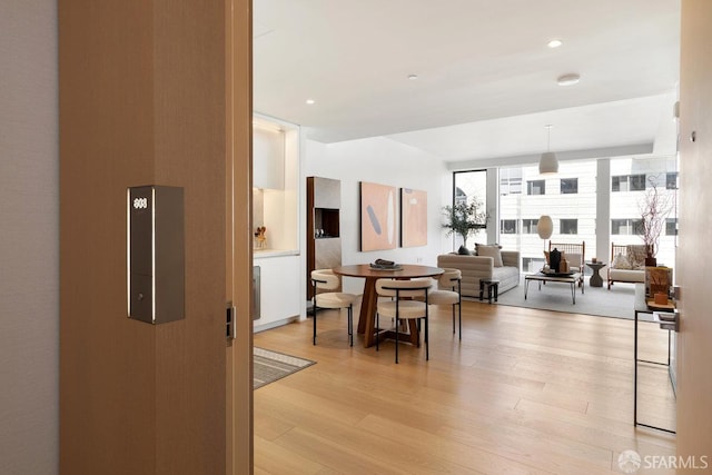 1 Steuart Ln Unit 608, San Francisco, CA 94105 - dining space with light wood-style floors