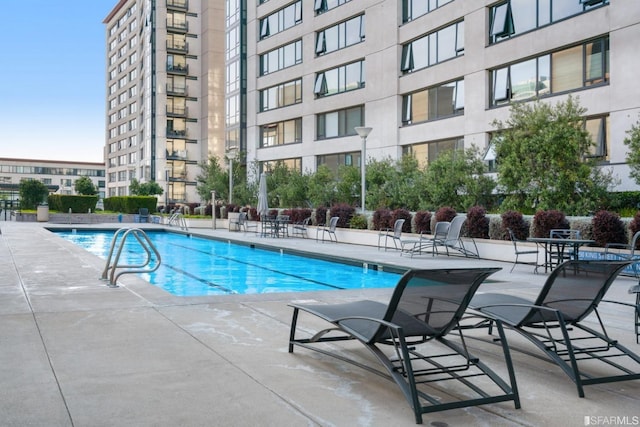 view of pool with a patio area