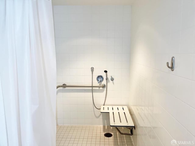 bathroom with a shower with shower curtain