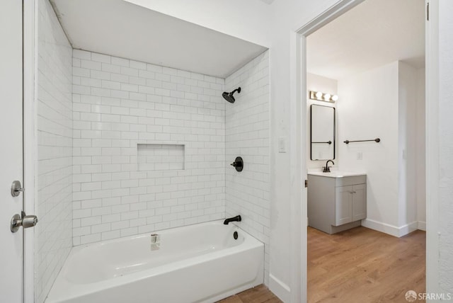 4411 Camino Vaqueros, Brentwood, CA 94513 - full bath with wood finished floors, vanity, and shower / washtub combination