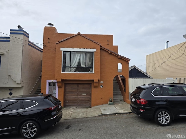 view of front of house with a garage