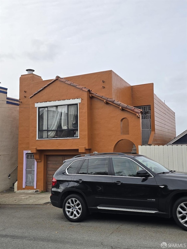 view of front of house with a garage