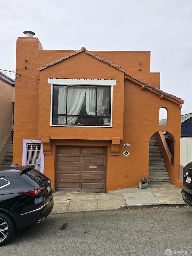 view of front of home featuring a garage