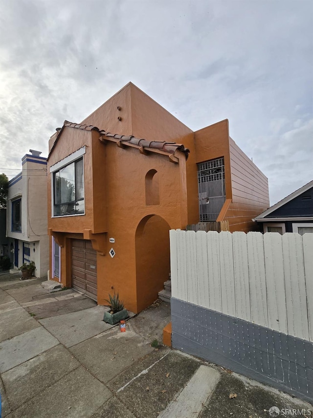 view of front of home featuring a garage