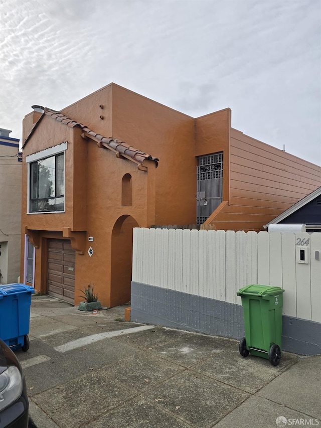 view of front of house with a garage