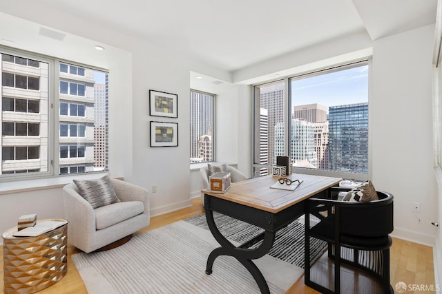 188 Minna St Unit 24A, San Francisco, CA 94105 - home office with light wood-type flooring and baseboards