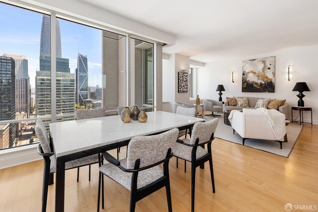 188 Minna St Unit 24A, San Francisco, CA 94105 - dining area featuring light wood-style flooring