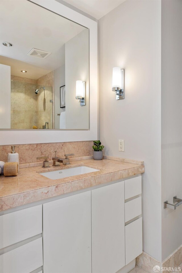 188 Minna St Unit 24A, San Francisco, CA 94105 - bathroom featuring vanity and a tile shower