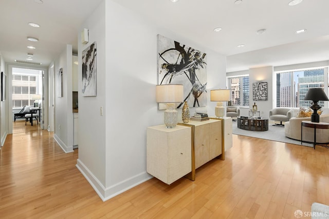 188 Minna St Unit 24A, San Francisco, CA 94105 - hall featuring healthy amount of natural light, light wood-type flooring, baseboards, and recessed lighting