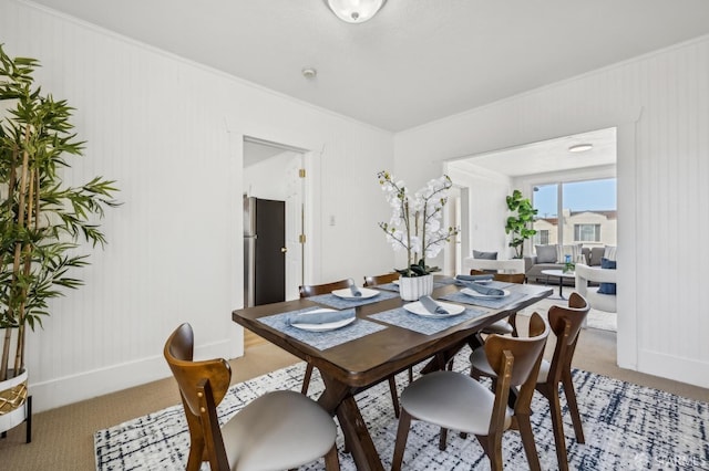 77 Reddy St, San Francisco, CA 94124 - dining room featuring light colored carpet, crown molding, and baseboards