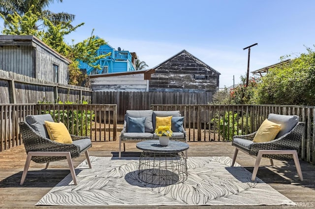 77 Reddy St, San Francisco, CA 94124 - view of patio with a fenced backyard, a wooden deck, and an outdoor hangout area