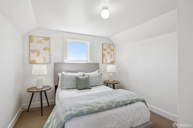 77 Reddy St, San Francisco, CA 94124 - bedroom with vaulted ceiling, baseboards, and carpet
