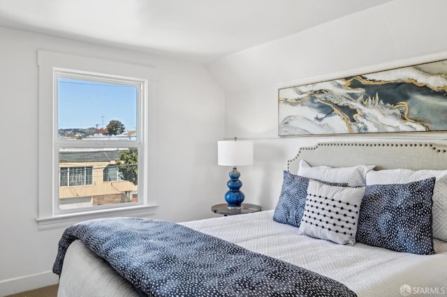 77 Reddy St, San Francisco, CA 94124 - bedroom with vaulted ceiling, baseboards, and carpet floors