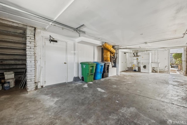 77 Reddy St, San Francisco, CA 94124 - garage with water heater and washer / clothes dryer